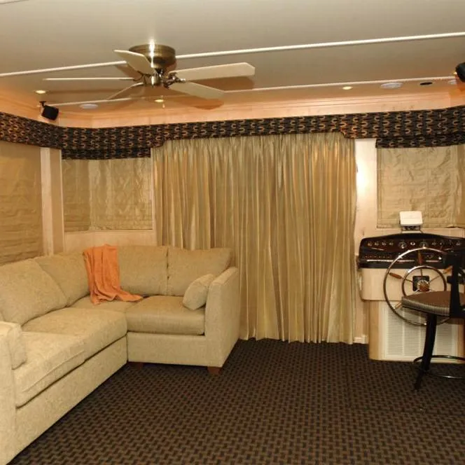 Slide: The Image of Luxurious interior of 2006 American Waterways Desert Rain Trip 15 houseboat with sofa and helm station. - 6