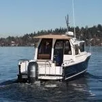 Slide: The Image of 2021 Ranger Tugs R-23 - Stern view - 2