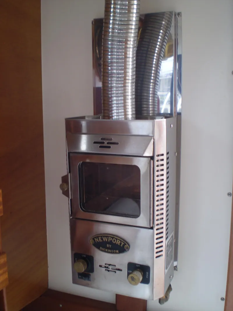 Slide: The Image of Stainless steel marine heater in a 2000 Devlin Surf Scoter boat interior. - 18