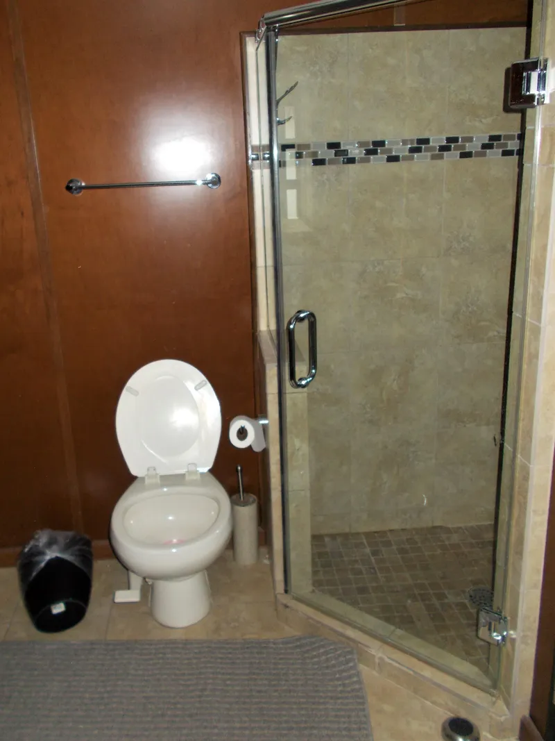 Slide: The Image of Bathroom in 2013 Bravada Tranquility Trip 17 with shower and toilet. - 6