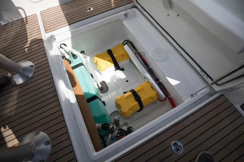 Slide: The Image of 2024 Beneteau Flyer 8 SUNdeck storage compartment with safety equipment and accessories. - 20