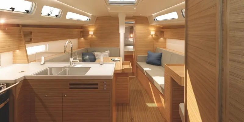Slide: The Image of Luxurious interior of 2026 X-Yachts X 4.0 sailboat with modern kitchen and seating area. - 10