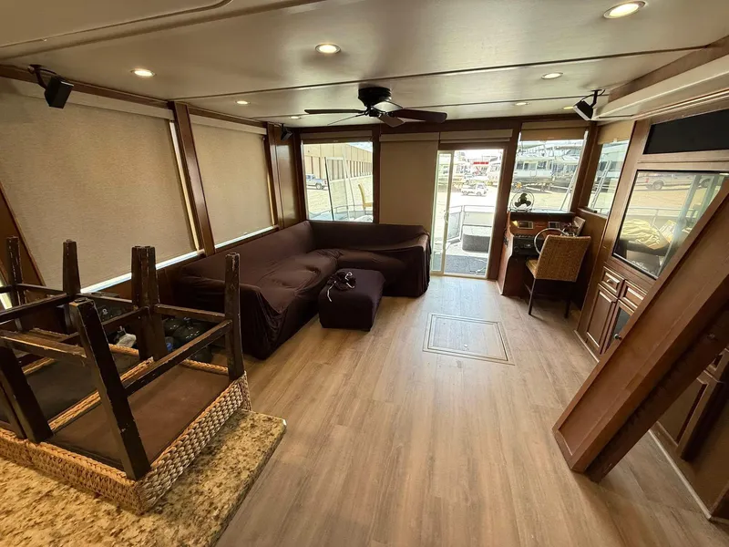 Slide: The Image of Luxurious interior of 2011 Bravada Dream Weaver Trip 14 houseboat with modern furnishings. - 17