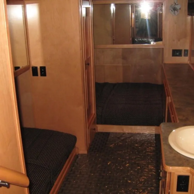 Slide: The Image of Interior of 2009 Sumerset Summer Breeze Trip15 houseboat with cozy sleeping area and sink. - 6