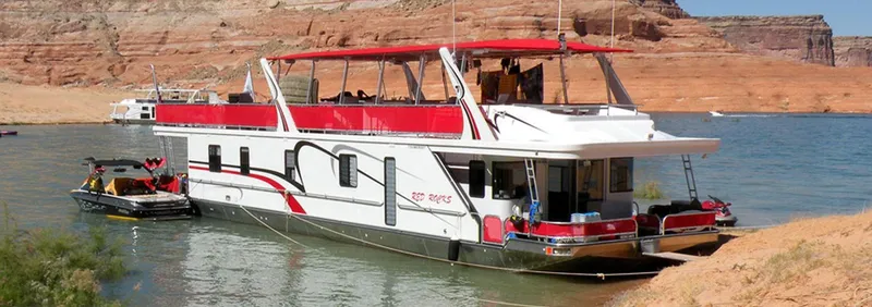 The Image of 2008 Sumerset Red Rocks Trip 11 houseboat docked in a scenic canyon lake. - 1