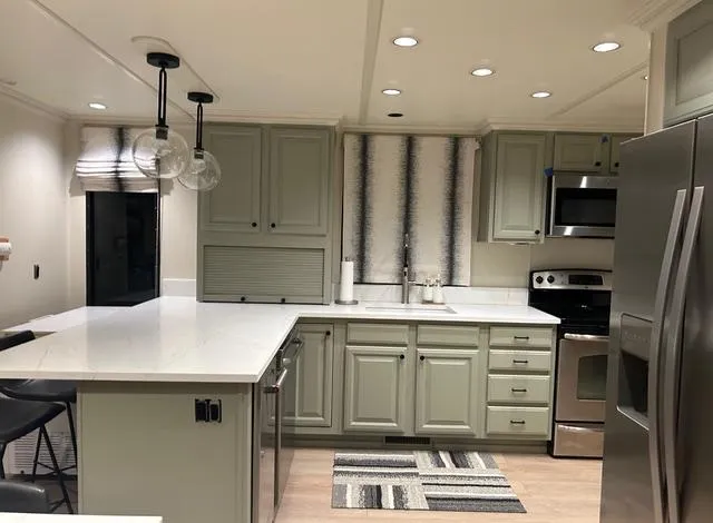 Slide: The Image of Modern kitchen in 2008 Sumerset Red Rocks Trip 11 houseboat with stainless steel appliances. - 20