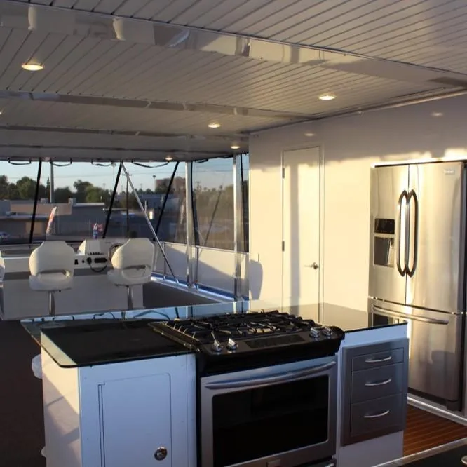 Slide: The Image of Modern kitchen on a 2015 Bravada Evolution houseboat. - 15