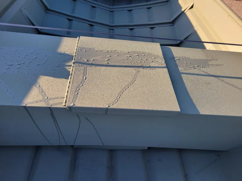 Slide: The Image of 2024 Polar Kraft MV1648 jon boat interior with water droplets on textured surface. - 3