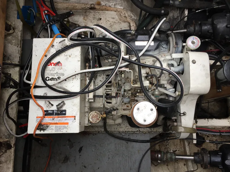 Slide: The Image of 1986 Cruisers Yachts 336 Ultra Vee engine compartment with Onan 9.0 Marine Genset. - 19