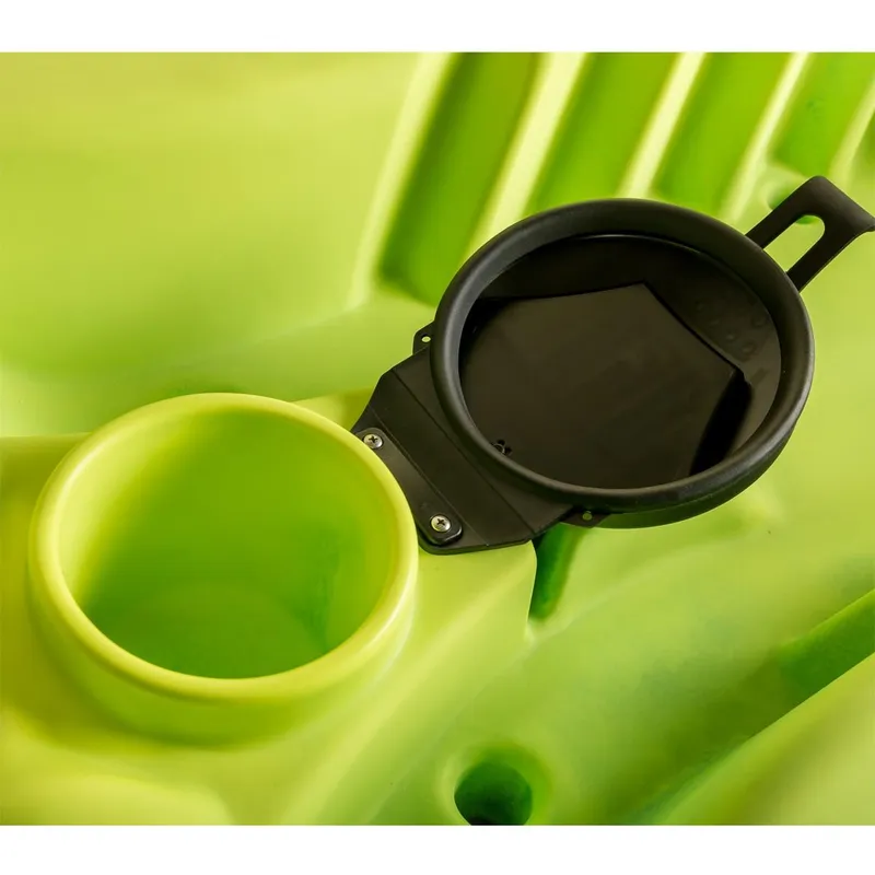 Slide: The Image of Close-up of Ocean Kayak Malibu 9.5 2023 model's storage compartment and cup holder. - 13