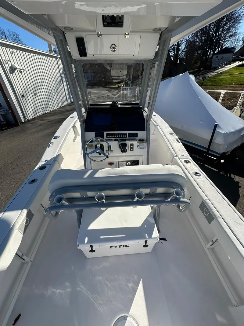 Slide: The Image of 2025 Sea Fox 248 Commander boat interior with steering console and seating. - 11