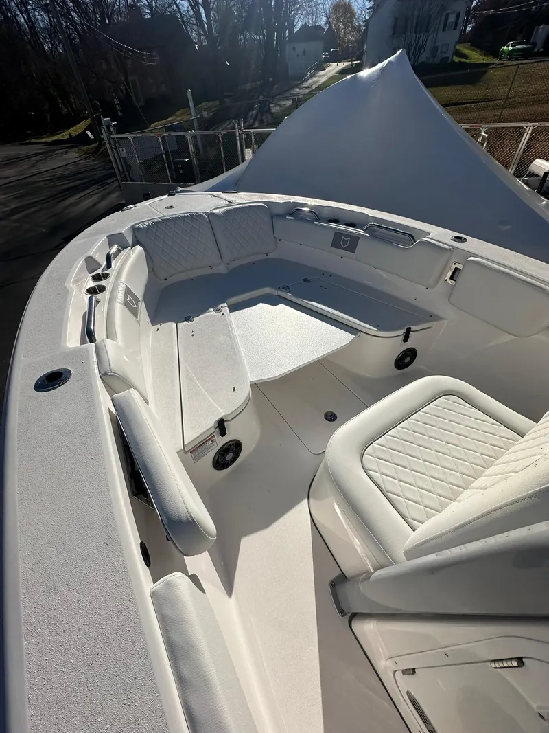 Slide: The Image of 2025 Sea Fox 248 Commander boat interior with seating and storage. - 17