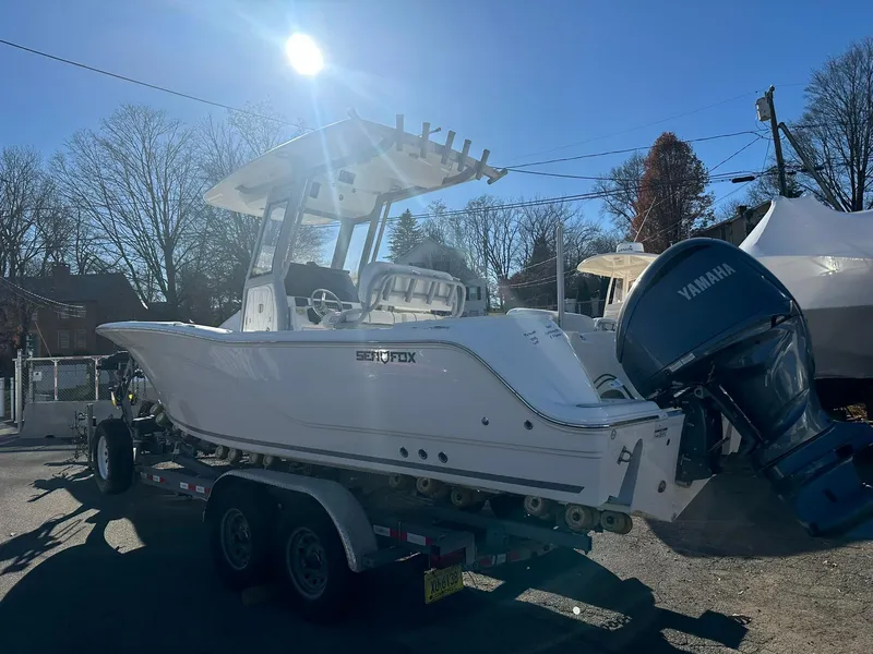 Slide: The Image of 2025 Sea Fox 248 Commander boat on trailer with Yamaha engine. - 2
