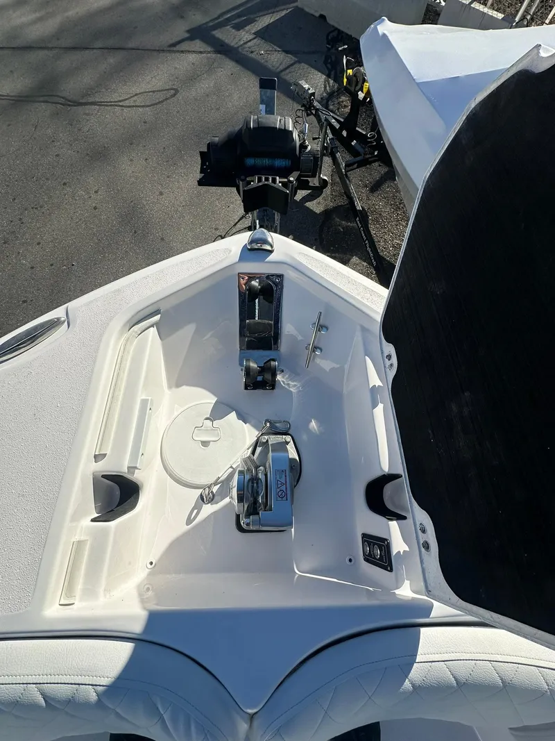 Slide: The Image of 2025 Sea Fox 248 Commander boat deck with anchor and storage compartments. - 21