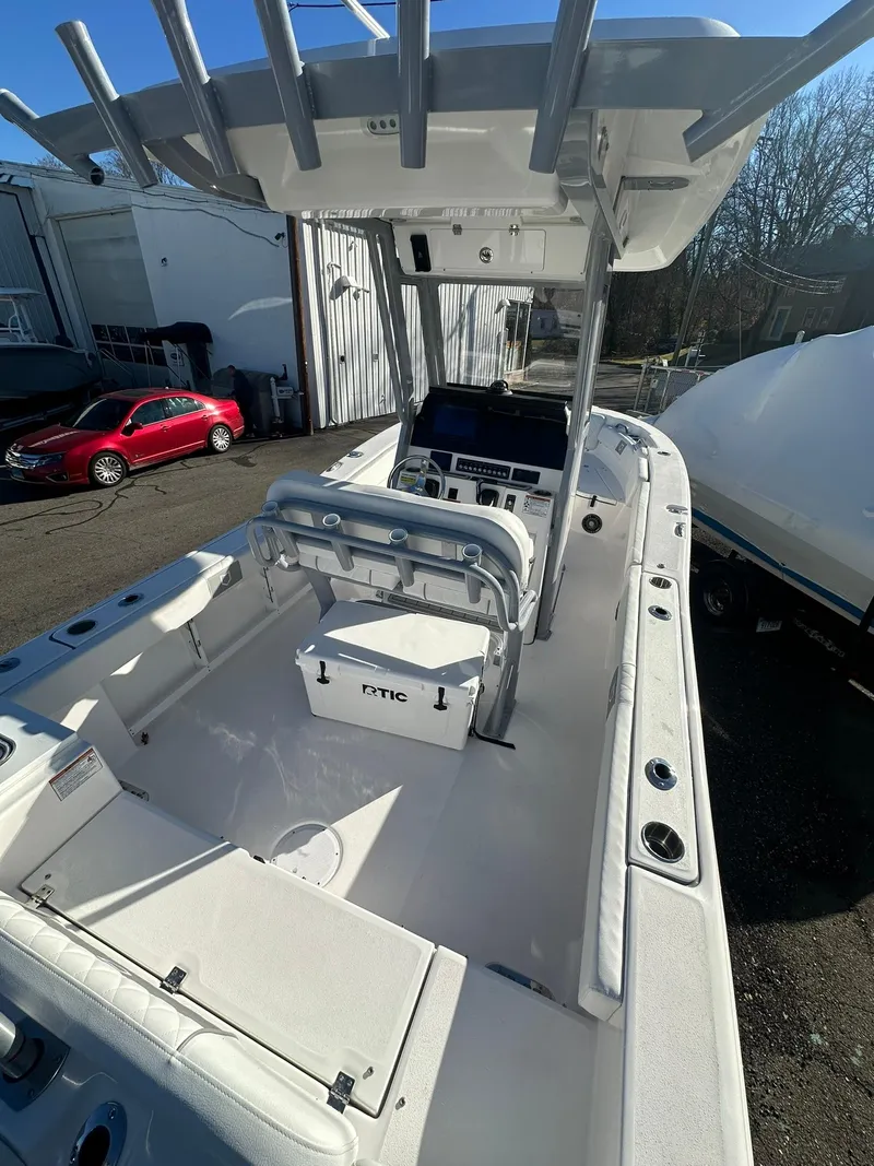 Slide: The Image of 2025 Sea Fox 248 Commander boat interior with T-top and seating. - 7