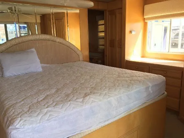 Slide: The Image of Cozy bedroom in 2002 Sharpe Just Because Trip 33 houseboat with natural light. - 14