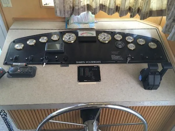 Slide: The Image of Control panel of a 2002 Sharpe Just Because Trip 33 houseboat. - 24