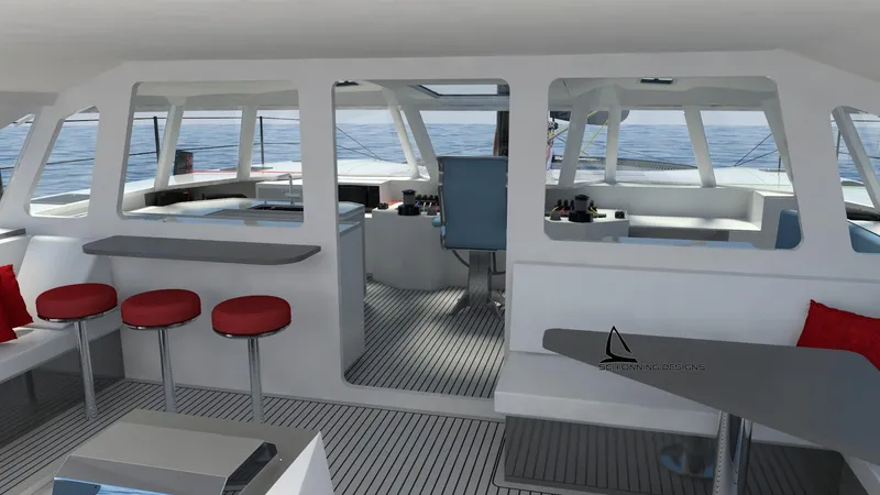 Slide: The Image of Modern interior of 2025 Razor Cat 52 Sailing Catamaran with red stools and ocean view. - 10