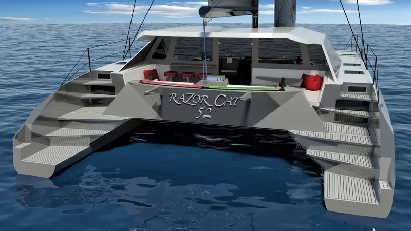 Slide: The Image of 2025 Razor Cat 52 Sailing Catamaran on open water, featuring modern design and spacious deck. - 6