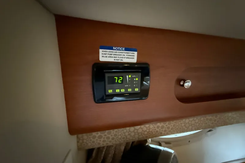 Slide: The Image of Thermostat display in 2003 Chaparral Signature 320 boat interior, showing 72 degrees. - 13
