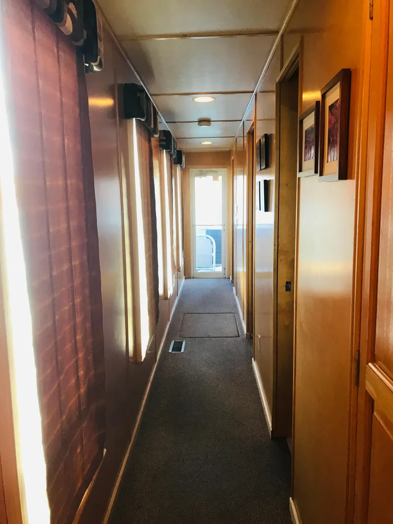 Slide: The Image of Hallway inside 2005 Stardust Cruisers Summer Obsession Share #37, featuring wood paneling and carpet. - 15