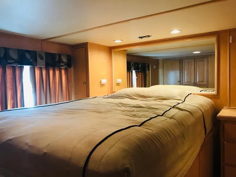Slide: The Image of Cozy bedroom interior in 2005 Stardust Cruisers Summer Obsession houseboat. - 19