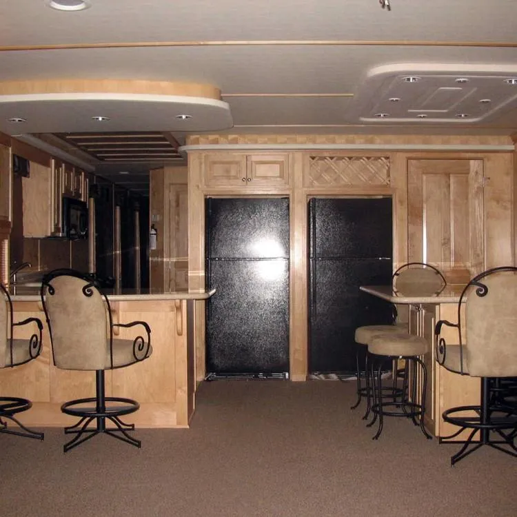 Slide: The Image of Luxurious 2005 Stardust Cruisers houseboat interior with elegant bar seating and wooden cabinetry. - 3