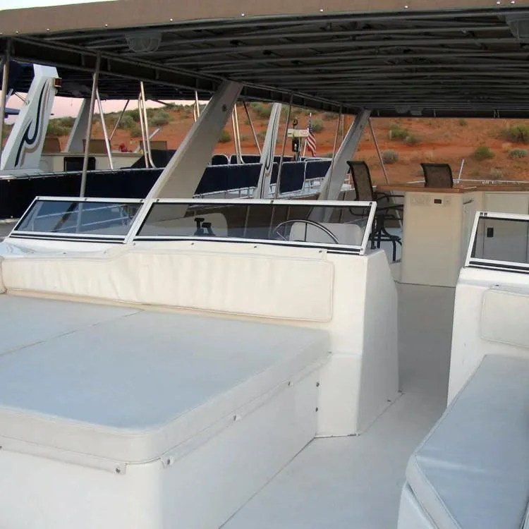 Slide: The Image of 2005 Stardust Cruisers Summer Obsession Share #37 houseboat interior with seating and helm. - 38