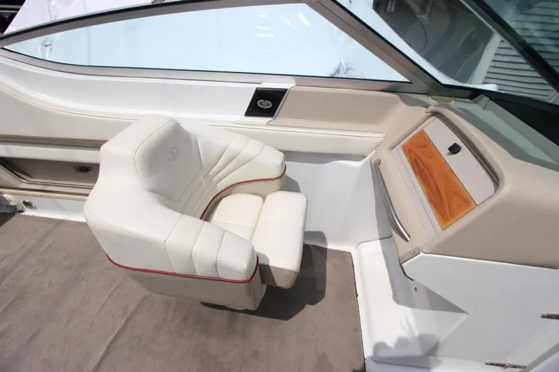 Slide: The Image of White leather seat in a 1997 Cobalt 272 BR boat interior. - 12