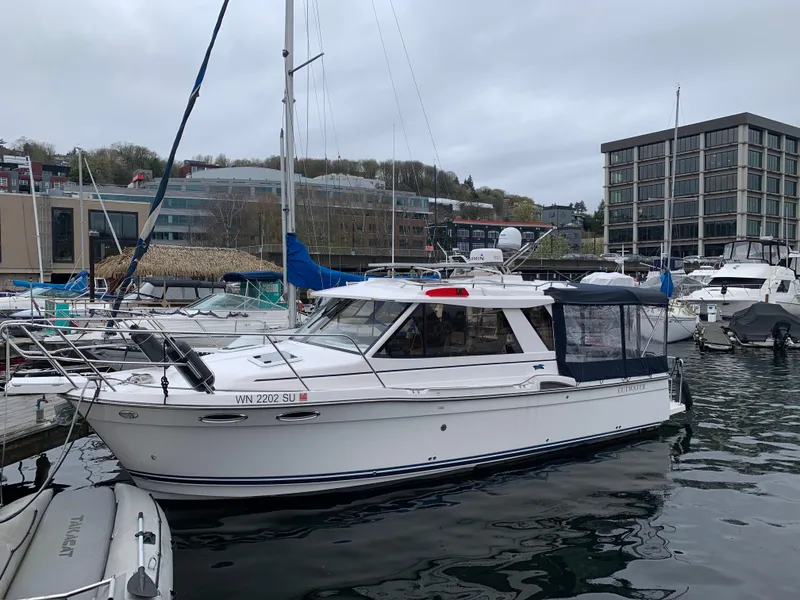 The Image of 2019 Cutwater C-28 boat docked in marina. - 0