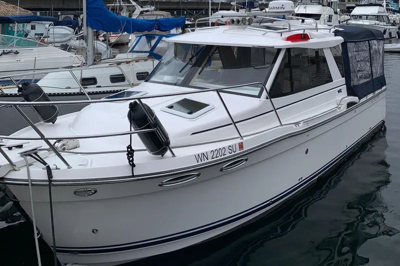 Slide: The Image of 2019 Cutwater C-28 boat docked in harbor. - 20