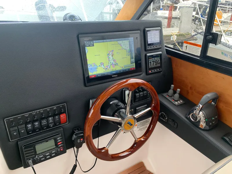 Slide: The Image of Helm of 2019 Cutwater C-28 yacht with navigation system. - 5