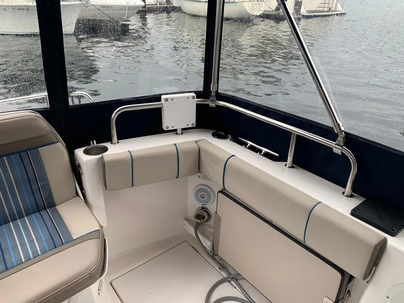 Slide: The Image of Interior of a 2019 Cutwater C-28 boat with blue upholstery. - 6
