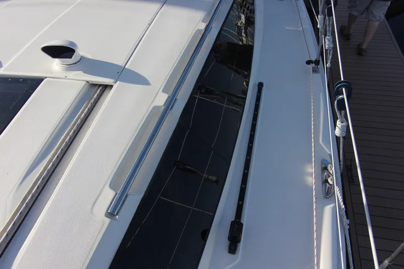 Slide: The Image of The deck of a 2015 Marlow-Hunter 37 with sleek lines and modern details. - 23