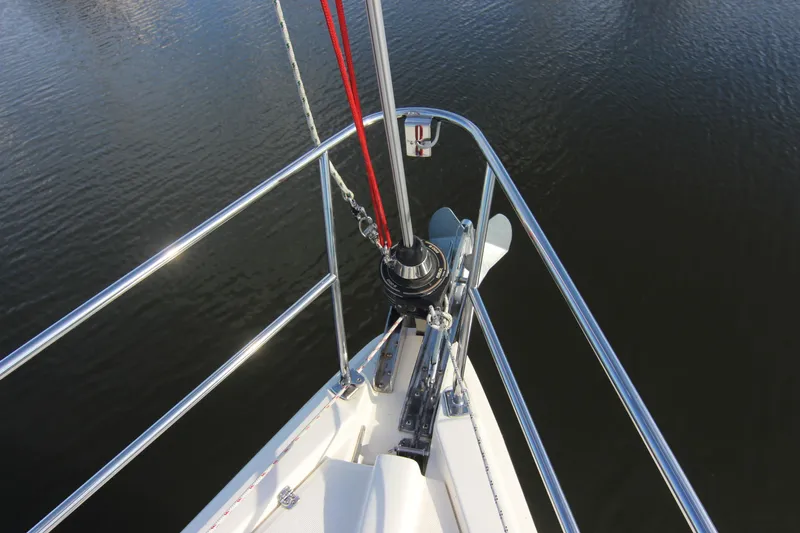 Slide: The Image of Bow view of a 2015 Marlow-Hunter 37 with stainless steel railing and anchor windlass. - 11