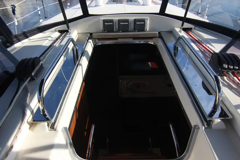 Slide: The Image of The image shows the cabin entrance of a 2015 Marlow-Hunter 37. - 29