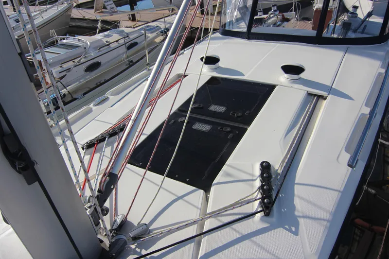 Slide: The Image of The deck of a 2015 Marlow-Hunter 37 with ropes and windows. - 22