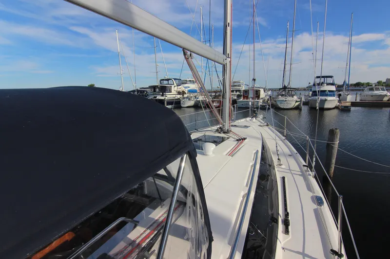 Slide: The Image of A 2015 Marlow-Hunter 37 is docked in a busy marina. - 10