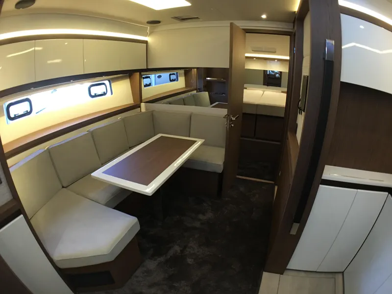 Slide: The Image of Interior of 2017 Jeanneau Leader 46 yacht with elegant seating area. - 25