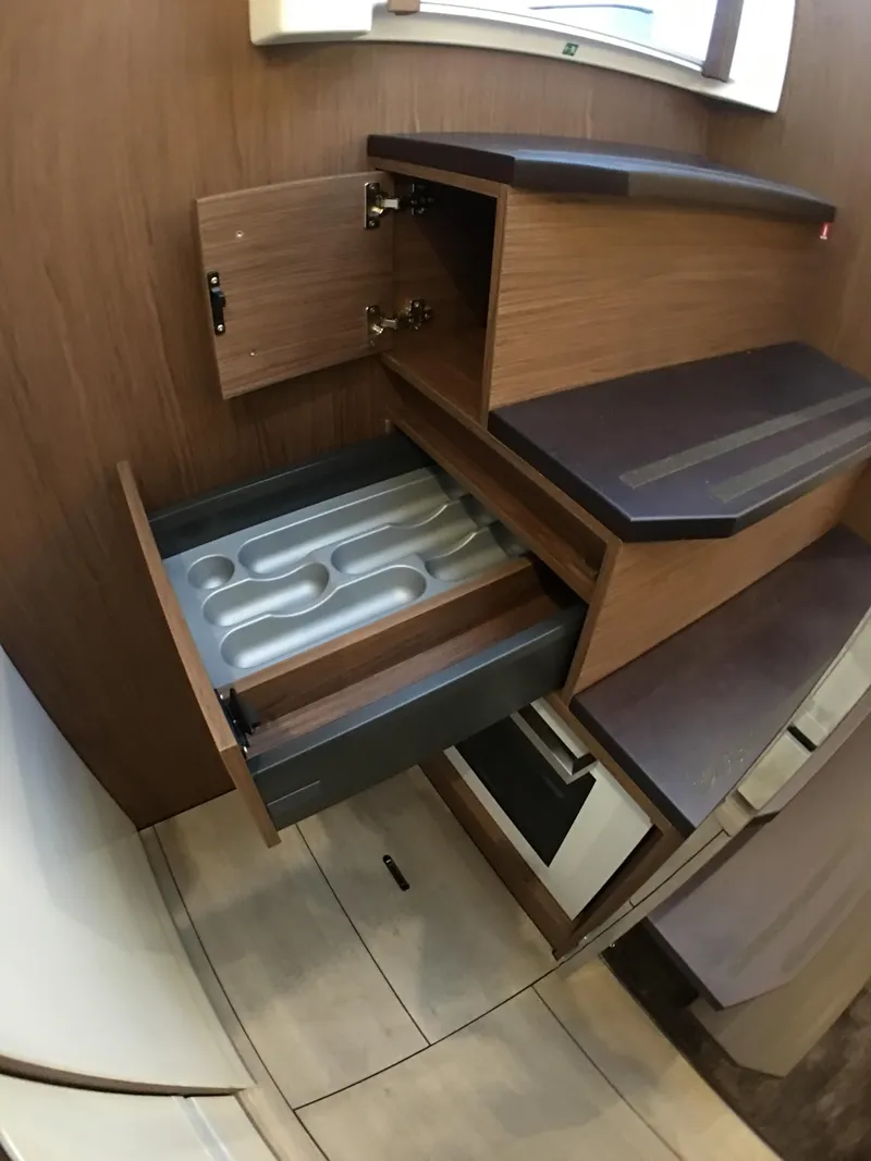 Slide: The Image of Interior of 2017 Jeanneau Leader 46 yacht with drawers and cabinets. - 31