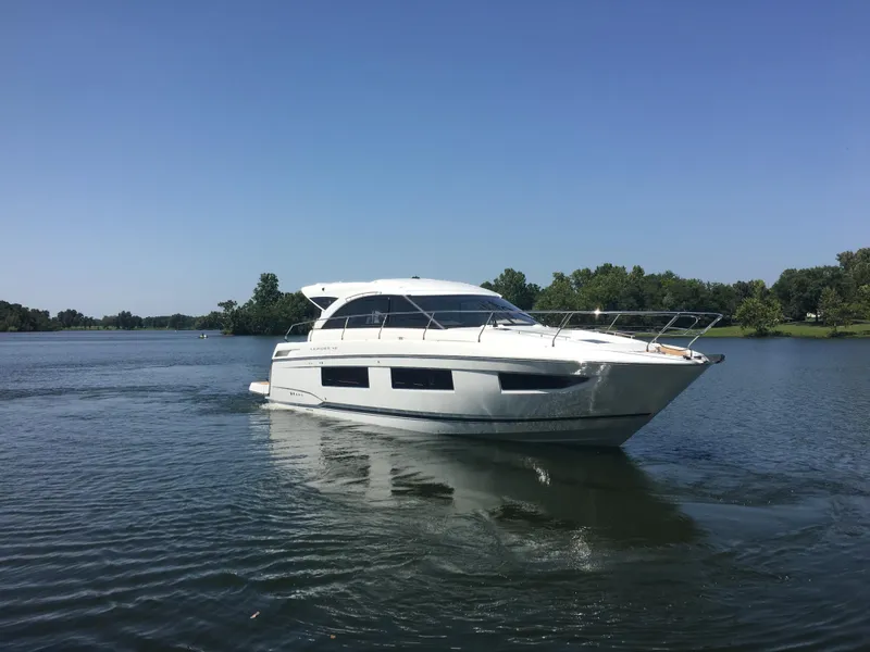 Slide: The Image of 2017 Jeanneau Leader 46 yacht on calm water. - 4