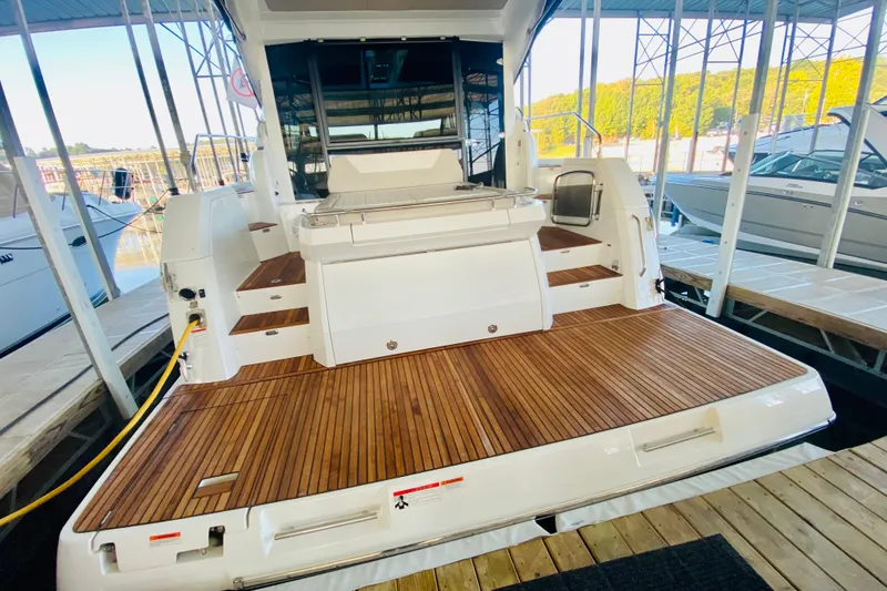 Slide: The Image of 2017 Jeanneau Leader 46 yacht with teak deck in marina setting. - 48