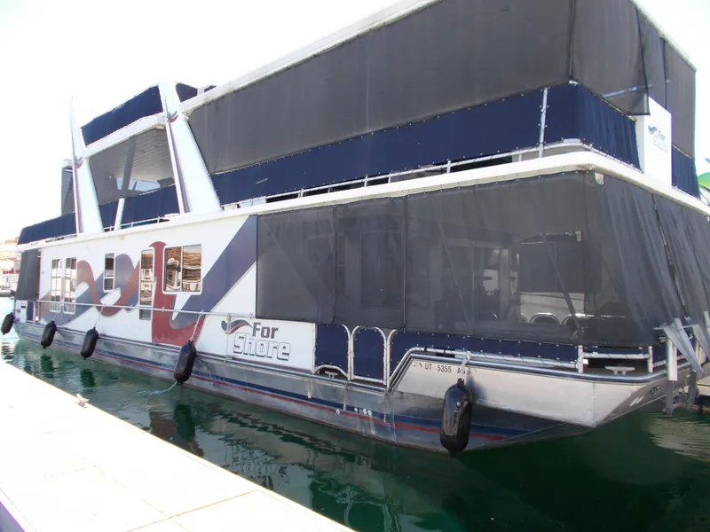 The Image of 2003 Stardust Cruisers For Shore 6 houseboat docked, featuring shared ownership. - 1
