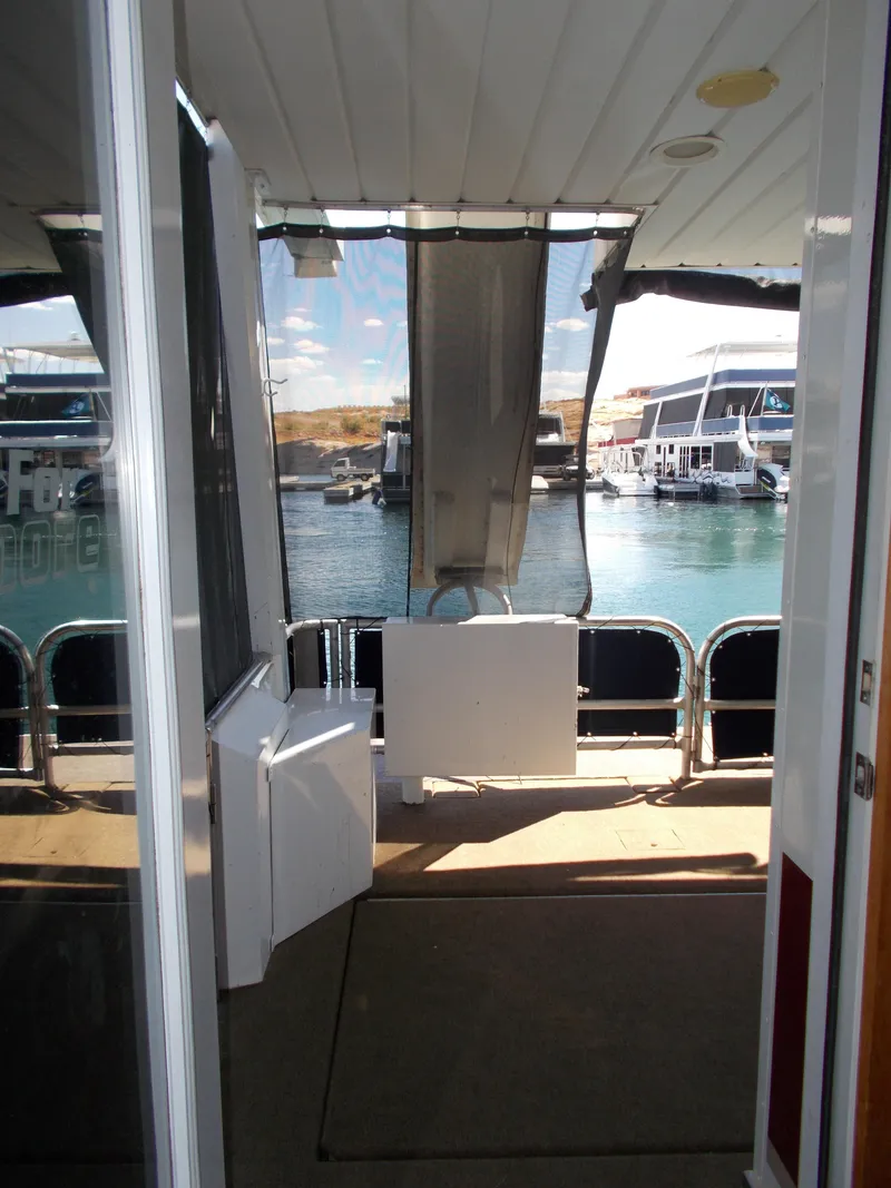 Slide: The Image of 2003 Stardust Cruisers For Shore 6 houseboat interior with marina view. - 31