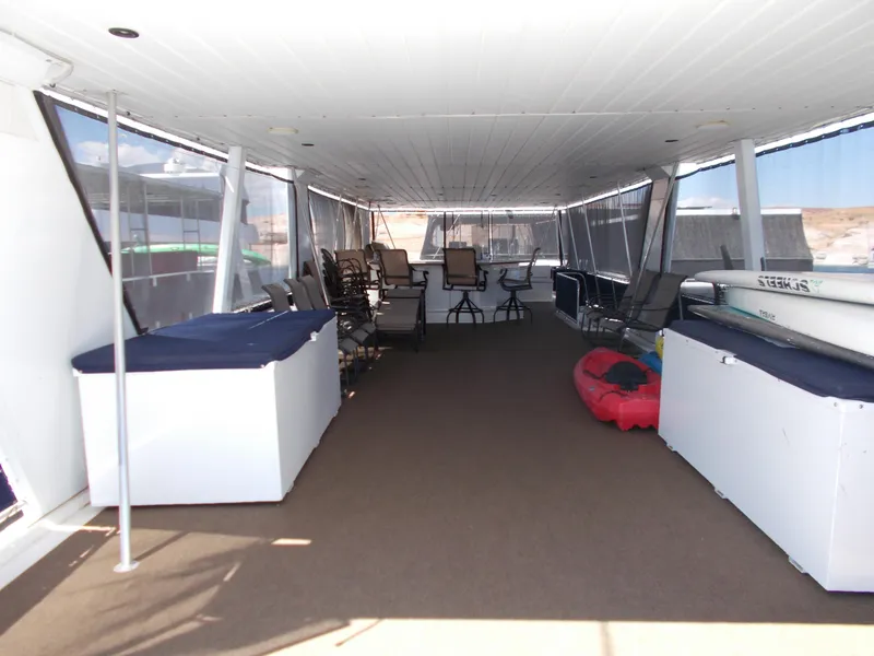Slide: The Image of Spacious deck of 2003 Stardust Cruisers For Shore 6 houseboat with seating and storage. - 35