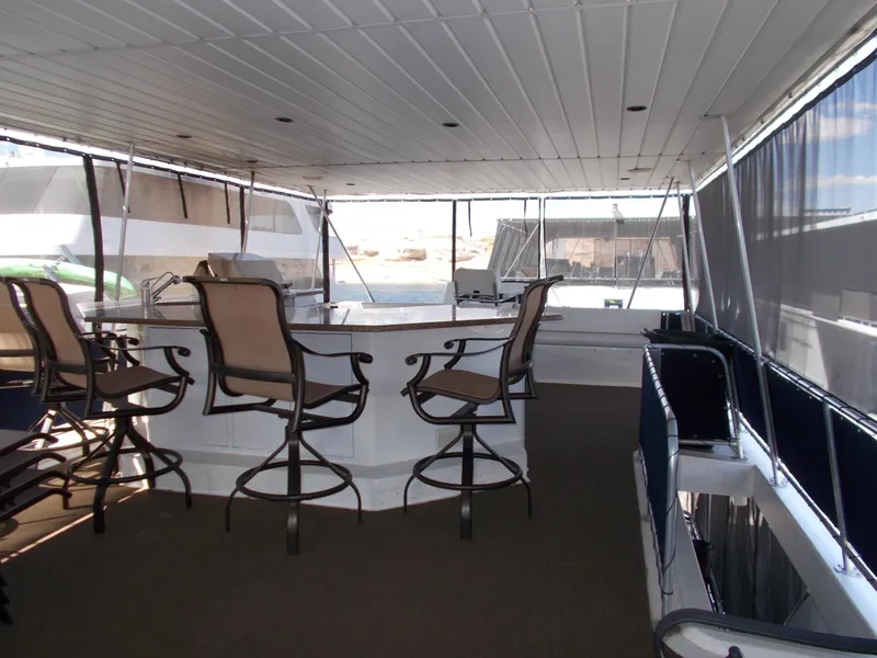 Slide: The Image of Spacious deck of 2003 Stardust Cruisers For Shore 6 houseboat with seating area. - 36