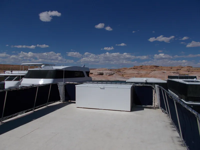Slide: The Image of Rooftop view of 2003 Stardust Cruisers For Shore 6 houseboat under clear blue sky. - 41