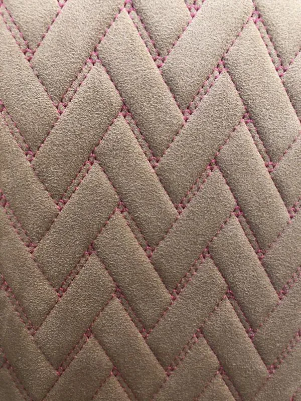 Slide: The Image of Quilted upholstery pattern on Hustler 39 Shotgun 2025 model. - 22
