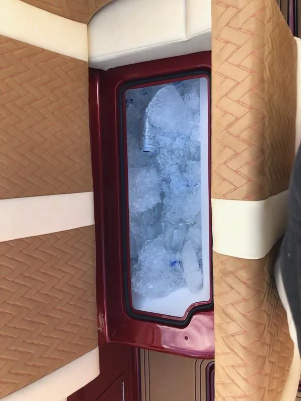 Slide: The Image of Built-in cooler with ice and drinks in 2025 Hustler 39 Shotgun boat. - 27