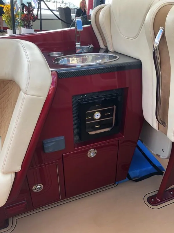 Slide: The Image of Luxury interior of 2025 Hustler 39 Shotgun boat with sink and storage. - 30